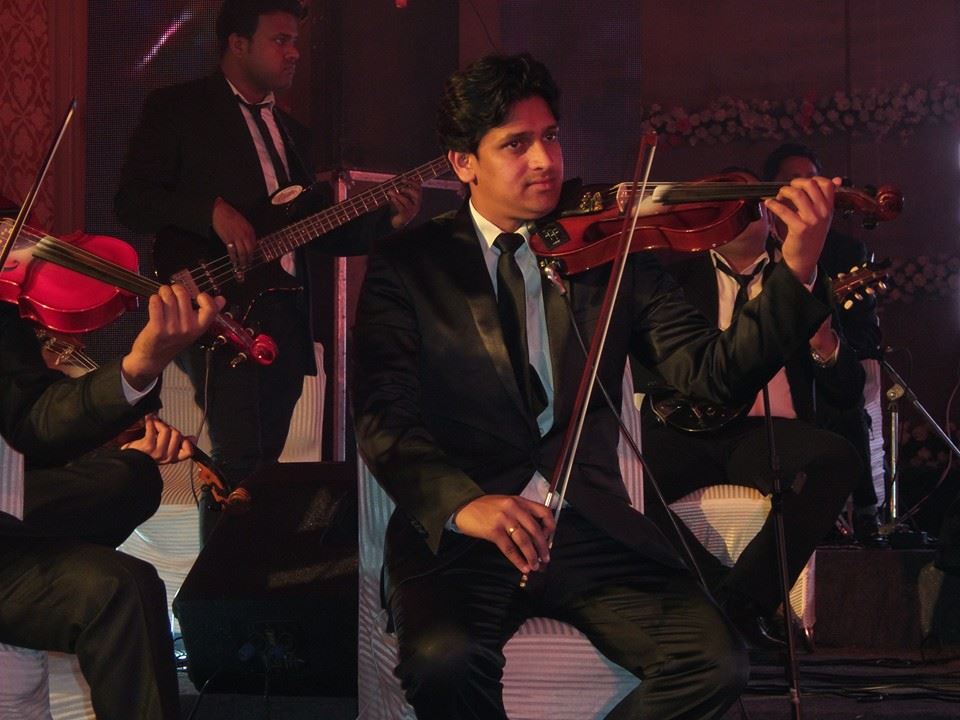 male violin player rajkot